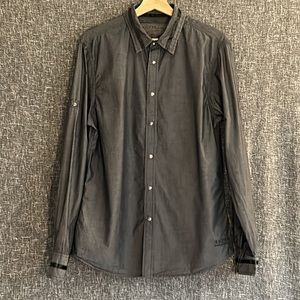 Guess button down, “Rock and Roll Saved My Soul”